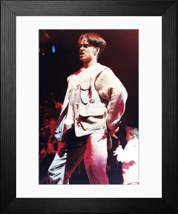 Framed Print : Take That perform at the N. E. C. Birmingham. Robbie Williams