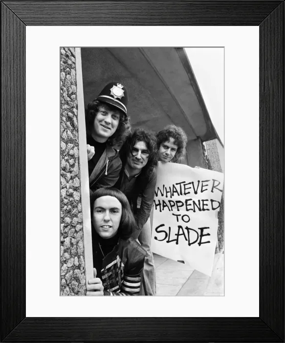 Framed Print : Glam rock group Slade posing for pictures in Birmingham City Centre. 25th March 1977 Framed Print : Glam rock group Slade posing for pictures in Birmingham City Centre. 25th March 1977