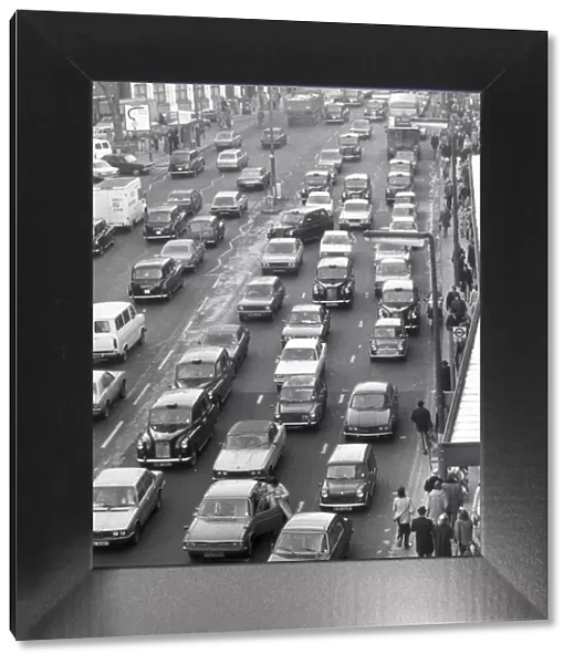 London traffic in Knightsbridge looking towards Hyde Park Corner. 6th January 1979
