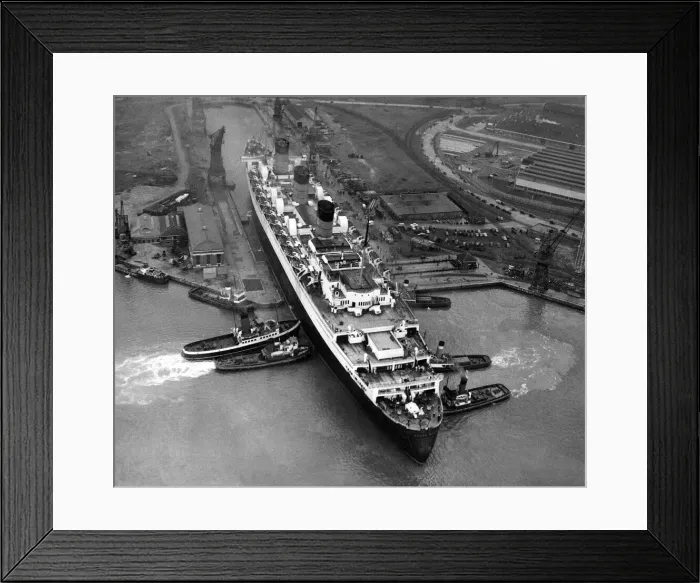 Framed Print : An aerial view of the liner Queen Mary leaving dry dock at Southampton Framed Print : An aerial view of the liner Queen Mary leaving dry dock at Southampton