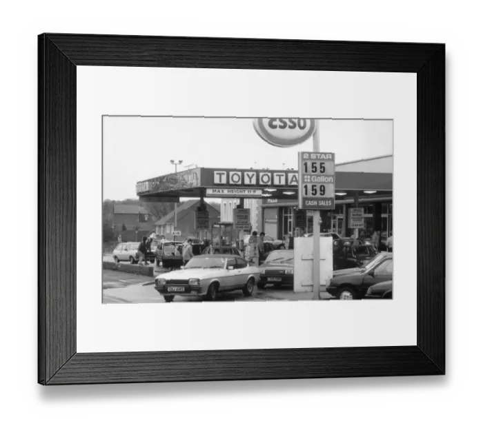 Framed Print : Esso Petrol Station with cars filling up and Ford Capri leaving. 2nd March 1986 Framed Print : Esso Petrol Station with cars filling up and Ford Capri leaving. 2nd March 1986