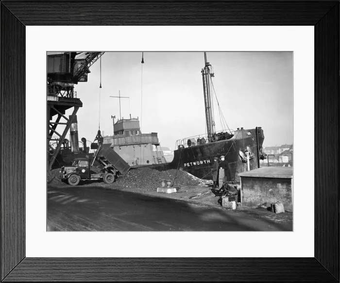 Framed Print : The Collier SS Petworth unloading her cargo of coal at Soreham gasworks, Sussex