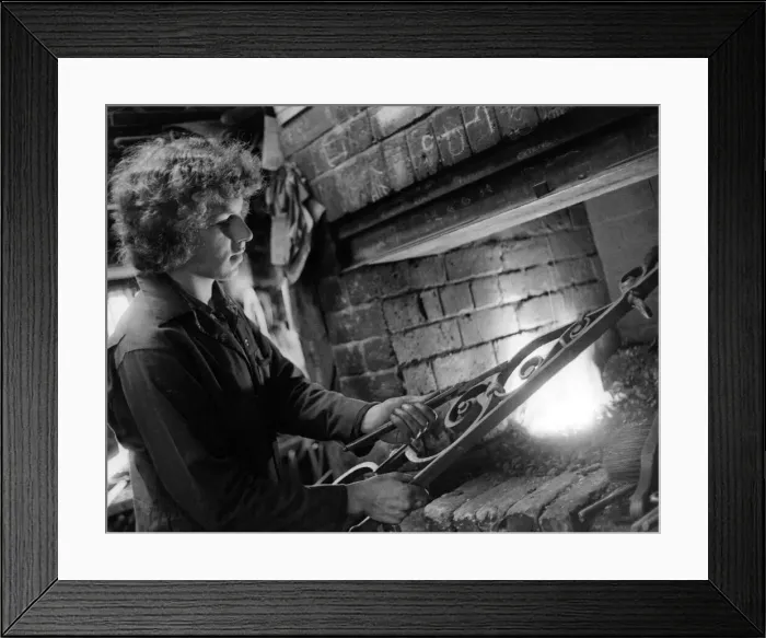 Framed Print : Nineteen year old Stephen Lunn is one of Britains top three apprentice blacksmiths Framed Print : Nineteen year old Stephen Lunn is one of Britains top three apprentice blacksmiths