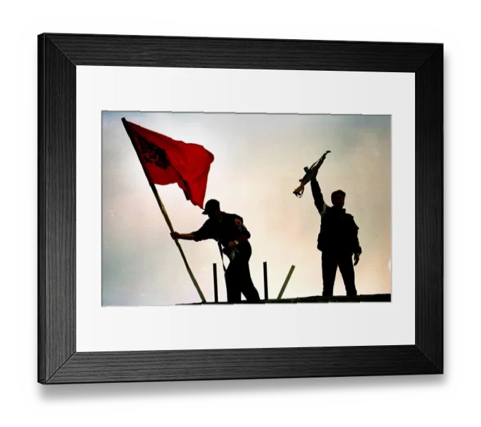 Framed Print : KLA soldiers place flag above a building in Pristina June 1999 PIC BY CHRIS WATT