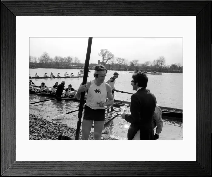 Framed Print : Boat Race Cambridge. Some of the Cambridge team members celebrate with Champagne after