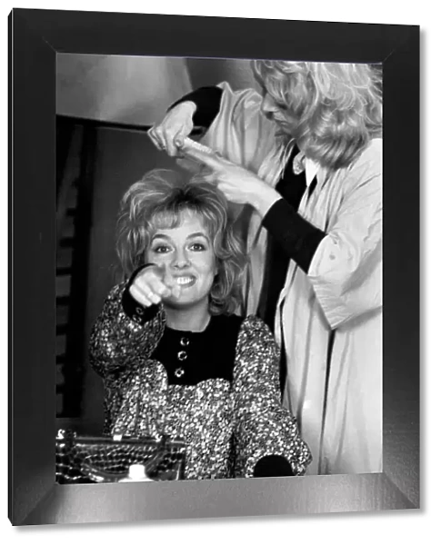 Thats life. Returns to B. B. C. 1. Esther Rantzen is prepared by a make-up girl