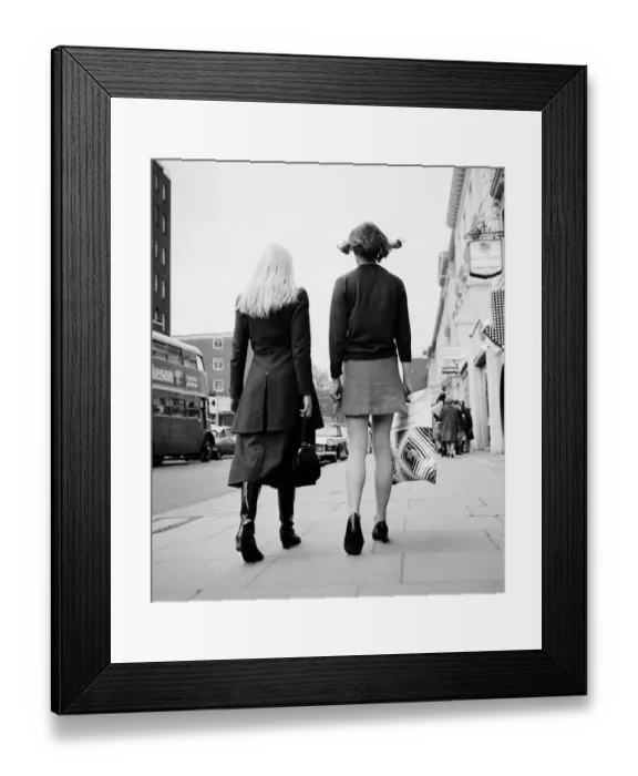 Framed Print : Kings Road, Chelsea. Fashion battlefield with a showdown between the Midi skirt