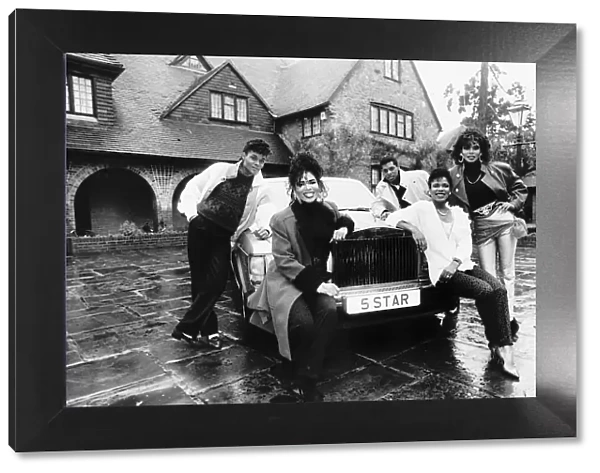 Five Star pop group stand outside mansion in Berkshire with new Rolls Royce. c. 1987