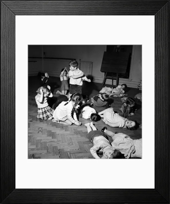 Framed Print : Infant schoolchildren playing during a dance and movement class. Feburary 1953 D715-004