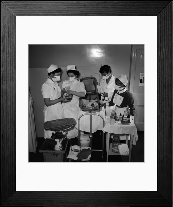 Framed Print : Midwives help delivery a two pound baby which was placed in an incubator. May 1953 D2623 Framed Print : Midwives help delivery a two pound baby which was placed in an incubator. May 1953 D2623