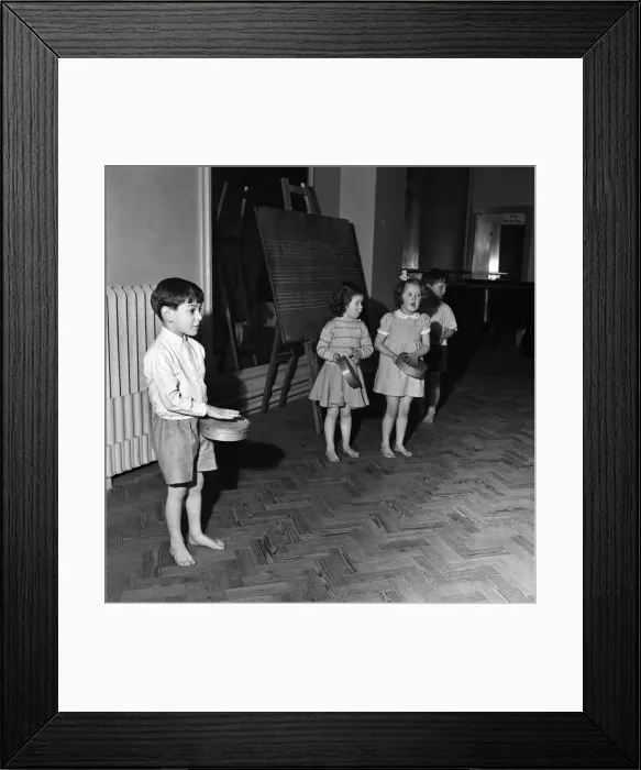 Framed Print : Infant schoolchildren playing during a dance and movement class. Feburary 1953 D715-006 Framed Print : Infant schoolchildren playing during a dance and movement class. Feburary 1953 D715-006