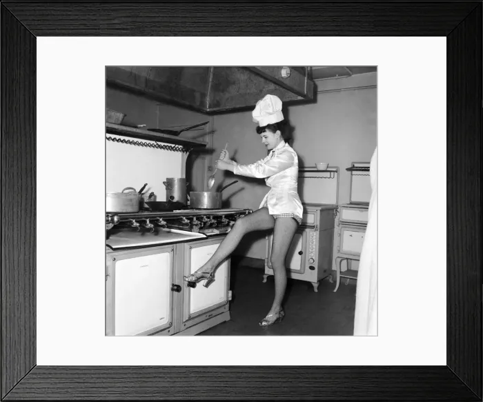 Framed Print : Chorus Girl rehearsing in the kitchen whilst preparing dinner. D748-001 Framed Print : Chorus Girl rehearsing in the kitchen whilst preparing dinner. D748-001
