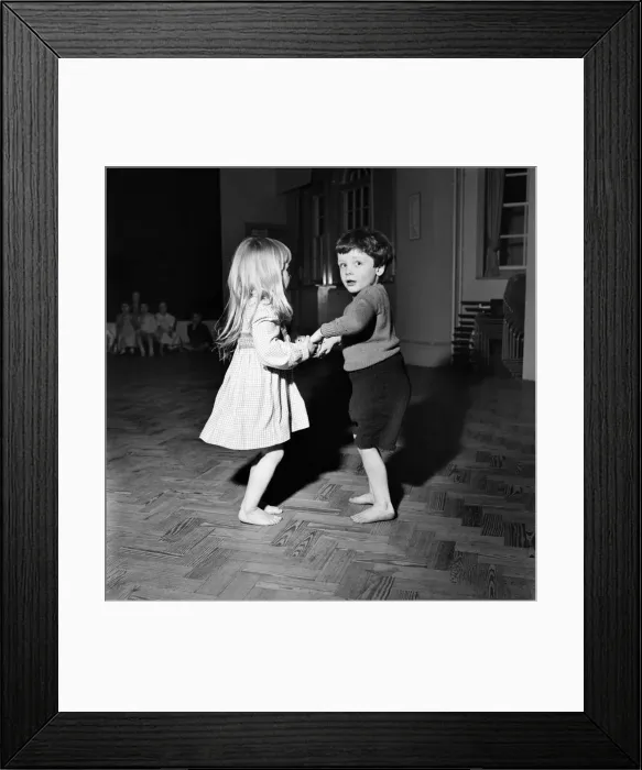 Framed Print : Would you care for the next dance? Infant schoolchildren playing during a dance Framed Print : Would you care for the next dance? Infant schoolchildren playing during a dance