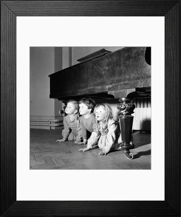 Framed Print : Hide and Seek. Infant schoolchildren playing during a dance and movement class Framed Print : Hide and Seek. Infant schoolchildren playing during a dance and movement class