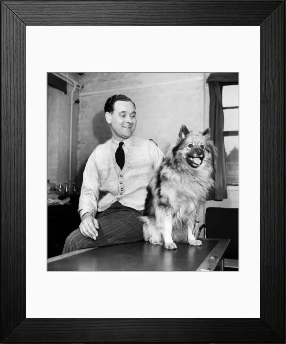 Framed Print : Clothes from dogs. Mr. Horne seen here modelling a waistcoat made from his dogs fur Framed Print : Clothes from dogs. Mr. Horne seen here modelling a waistcoat made from his dogs fur