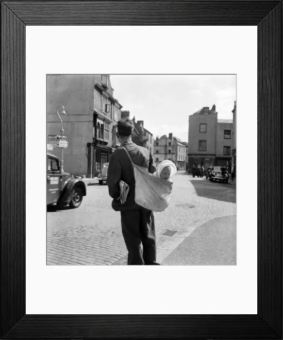 Framed Print : Bill Ward delivering papers and carrying baby grand daughter Jennifer Howbley Framed Print : Bill Ward delivering papers and carrying baby grand daughter Jennifer Howbley