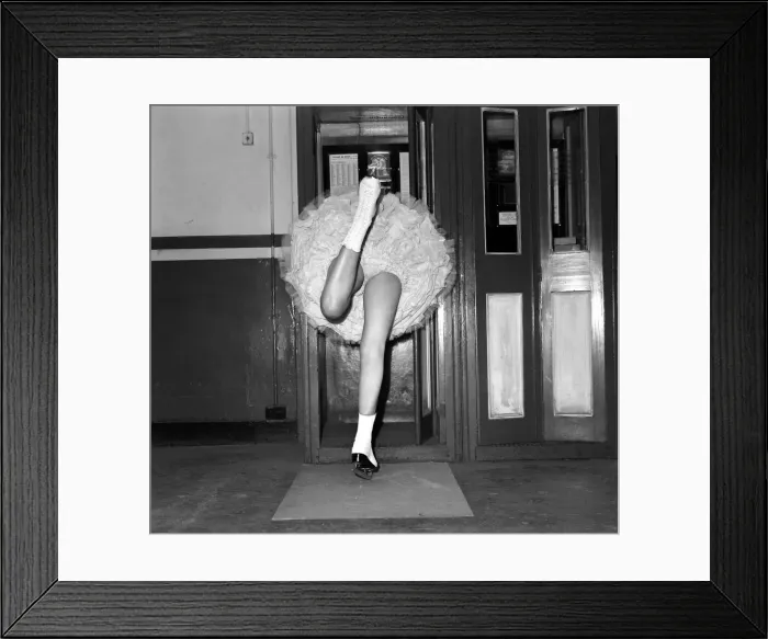 Framed Print : Annette Rees, Ice Skater seen here making a phone call. March 1953 D1096 Framed Print : Annette Rees, Ice Skater seen here making a phone call. March 1953 D1096