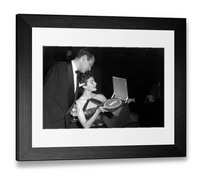 Framed Print : National film awards 1953 - Ava Gardner showing Sir Laurence Olivier the plaque she Framed Print : National film awards 1953 - Ava Gardner showing Sir Laurence Olivier the plaque she