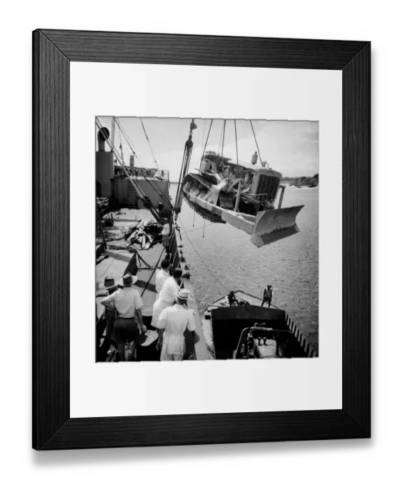 Framed Print : East African Groundnuts Scheme. Loading caterpillar tractors and road drainers Framed Print : East African Groundnuts Scheme. Loading caterpillar tractors and road drainers