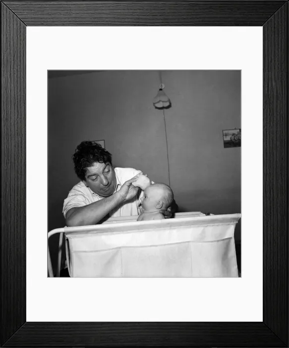 Framed Print : Sid Field with baby. September 1948 O14844-002 Framed Print : Sid Field with baby. September 1948 O14844-002
