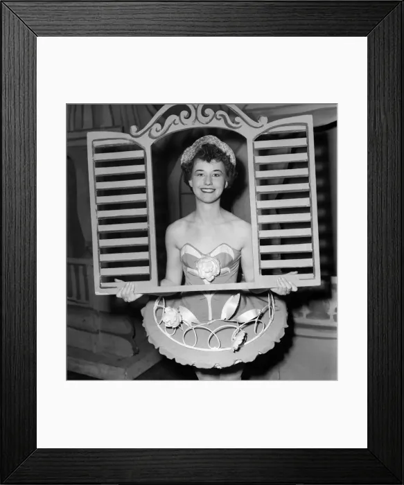 Framed Print : And through the square window. Chorus girl holding window frame Framed Print : And through the square window. Chorus girl holding window frame