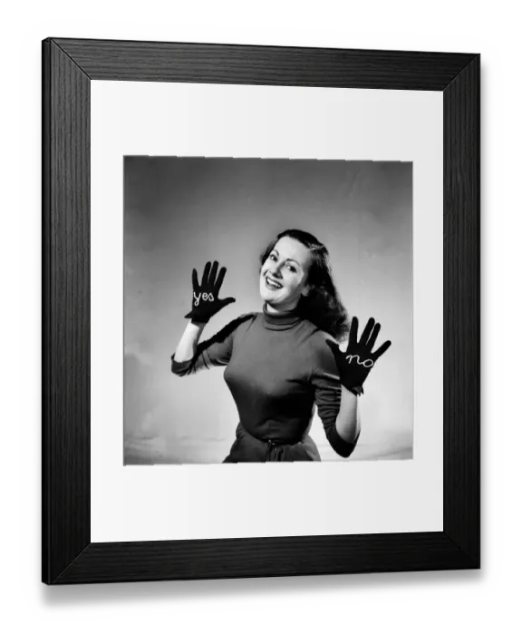 Framed Print : Woman modelling Yes-No Glove. December 1952 C6269-001