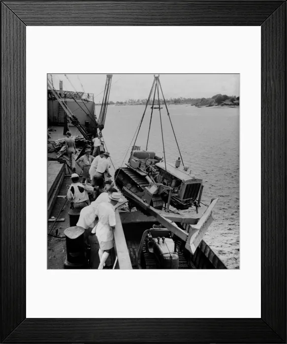 Framed Print : East African Groundnuts Scheme. Loading caterpillar tractors and road drainers Framed Print : East African Groundnuts Scheme. Loading caterpillar tractors and road drainers