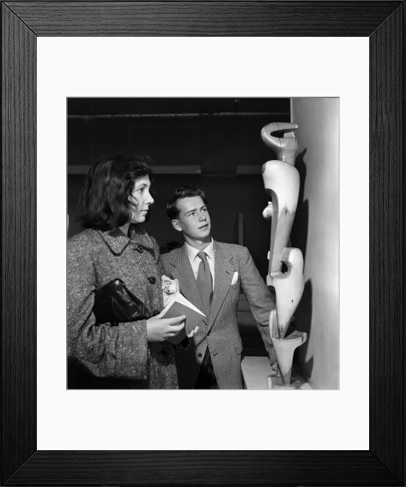 Framed Print : People examining pieces of art at the Exhibition of Sculpture at Burlington Galleries