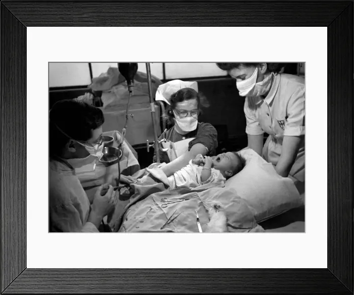 Framed Print : Hospital operation hearts. Babys life saved by blood transfusion. October 1946 O5112 Framed Print : Hospital operation hearts. Babys life saved by blood transfusion. October 1946 O5112