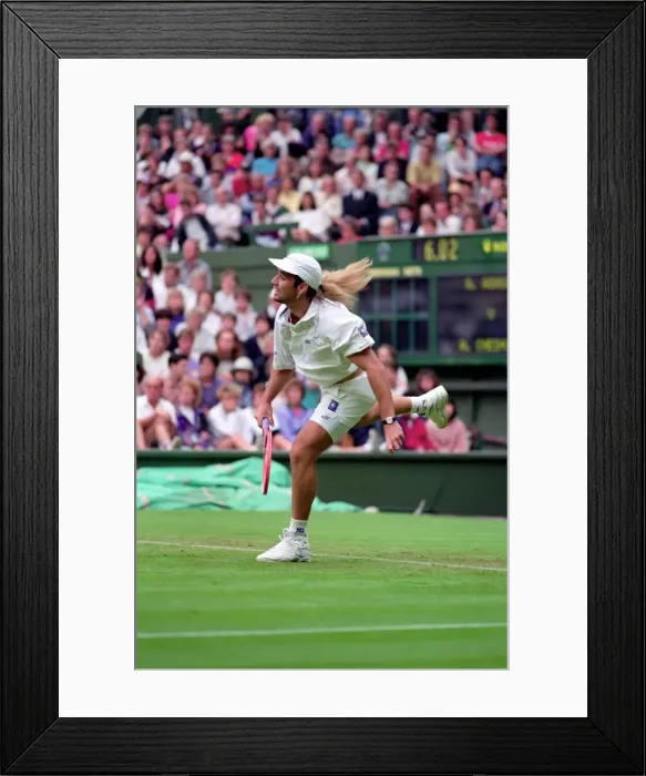 Framed Print : All England Lawn Tennis Championships at Wimbledon. Andre Agassi in action during Framed Print : All England Lawn Tennis Championships at Wimbledon. Andre Agassi in action during