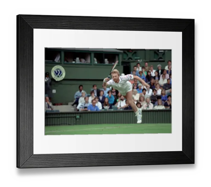 Framed Print : All England Lawn Tennis Championships at Wimbledon. Boris Becker in action against Omar
