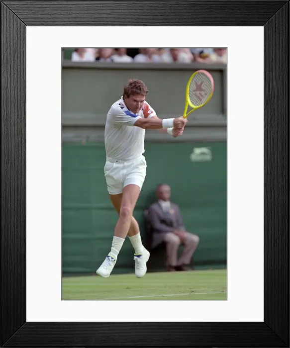 Framed Print : All England Lawn Tennis Championships at Wimbledon. Jimmy Connors in action during his