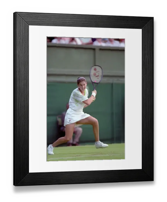 Framed Print : All England Lawn Tennis Championships at Wimbledon. Monica Seles in action during