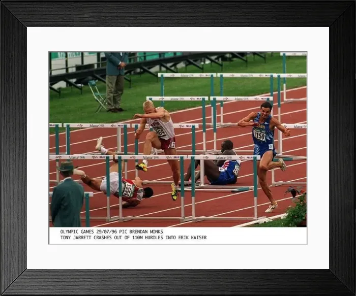 : Tony Jarrett crashes out of the 110 Metre hurdles and into Erik Kaiser at the Olympic : Tony Jarrett crashes out of the 110 Metre hurdles and into Erik Kaiser at the Olympic