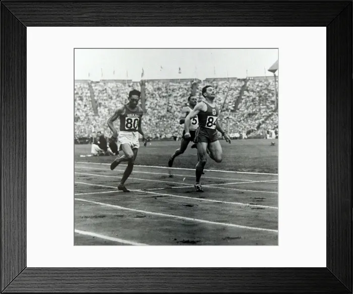 Framed Print : 1948 Olympic Games Competitors cross the finishing line in the Wembley Stadium