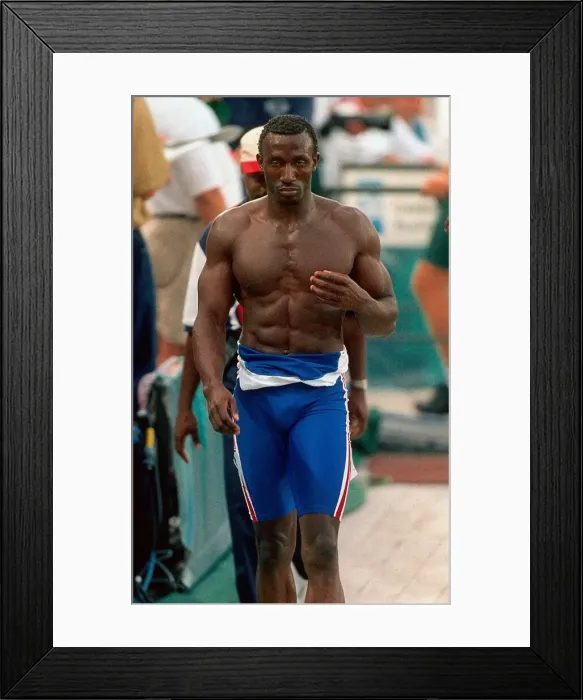 Framed Print : Atlanta Olympics 1996 Lindford Christie laves the track after being disqualified Framed Print : Atlanta Olympics 1996 Lindford Christie laves the track after being disqualified