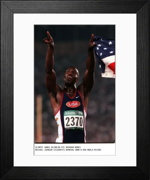 : Michael Johnson celebrates his win in the 200 metres and the new World record : Michael Johnson celebrates his win in the 200 metres and the new World record