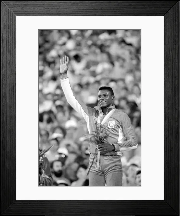 Framed Print : Los Angeles 1984 Carl Lewis celebrates after winning the 200m at the Olympic Games
