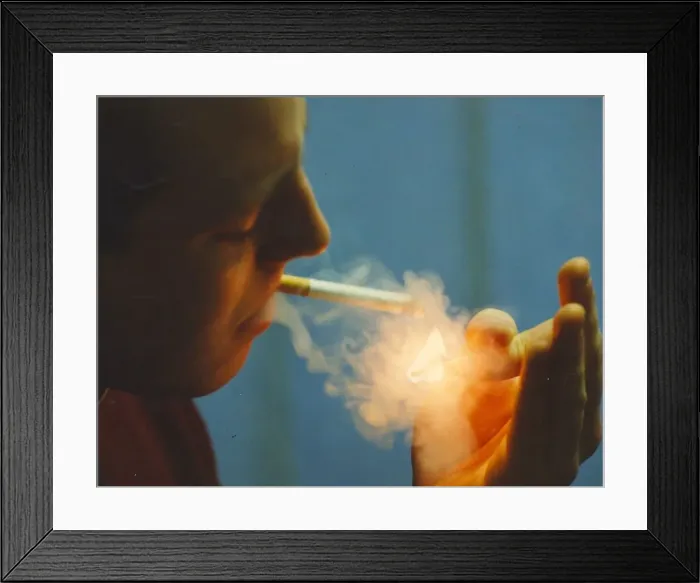 Framed Print : A picture of a man (Posed model) smoking Framed Print : A picture of a man (Posed model) smoking