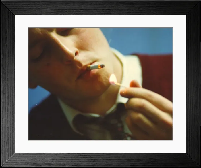 Framed Print : A picture of a man (Posed model) smoking Framed Print : A picture of a man (Posed model) smoking