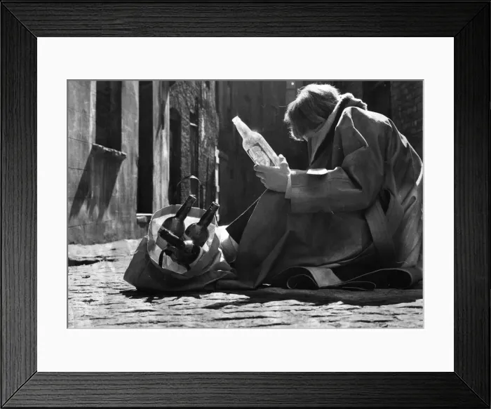 Framed Print : A picture of a down and out alcoholic