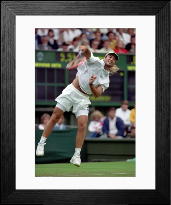 Framed Print : All England Lawn Tennis Championships at Wimbledon. Andre Agassi in action during