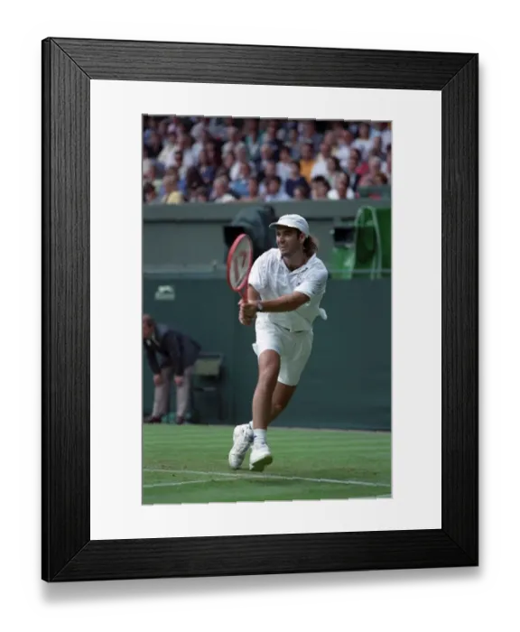 Framed Print : All England Lawn Tennis Championships at Wimbledon. Andre Agassi in action during Framed Print : All England Lawn Tennis Championships at Wimbledon. Andre Agassi in action during