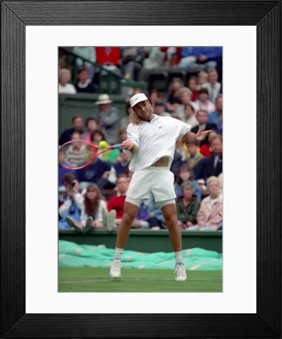 Framed Print : All England Lawn Tennis Championships at Wimbledon. Andre Agassi in action during Framed Print : All England Lawn Tennis Championships at Wimbledon. Andre Agassi in action during