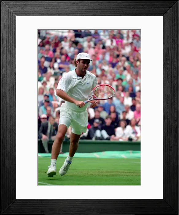 Framed Print : All England Lawn Tennis Championships at Wimbledon. Andre Agassi in action during Framed Print : All England Lawn Tennis Championships at Wimbledon. Andre Agassi in action during