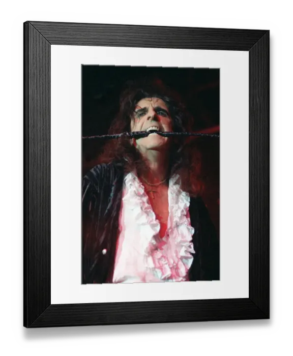 Framed Print : Alice Cooper pop singer with whip in his mouth on stage at Barrowlands Glasgow Framed Print : Alice Cooper pop singer with whip in his mouth on stage at Barrowlands Glasgow