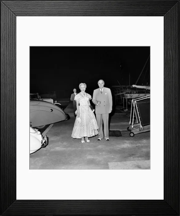 Framed Print : Sir Bernard and Lady Docker seen here on their yacht in Cannes. September 1952 C4568-001 Framed Print : Sir Bernard and Lady Docker seen here on their yacht in Cannes. September 1952 C4568-001