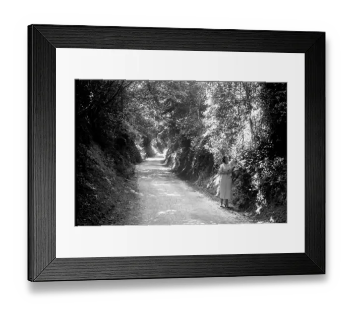 Framed Print : Woman walks in a country lane. Rural Scenes January 1938 OL302A-003 Framed Print : Woman walks in a country lane. Rural Scenes January 1938 OL302A-003