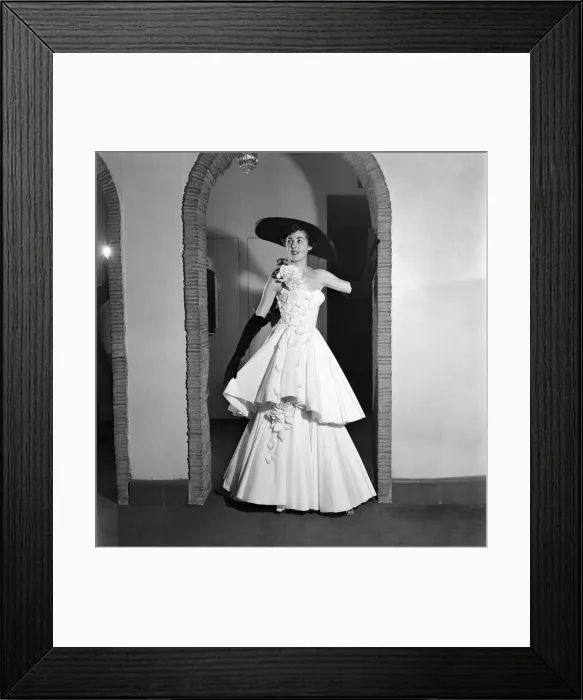 Framed Print : Miss Shirley Galley aged 19 years, The Velvet Girl, of London is seen wearing a dress Framed Print : Miss Shirley Galley aged 19 years, The Velvet Girl, of London is seen wearing a dress