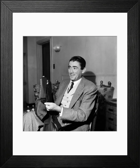 Framed Print : Gregory Peck and purchases from Burlington arcade. October 1952 C5328 Framed Print : Gregory Peck and purchases from Burlington arcade. October 1952 C5328